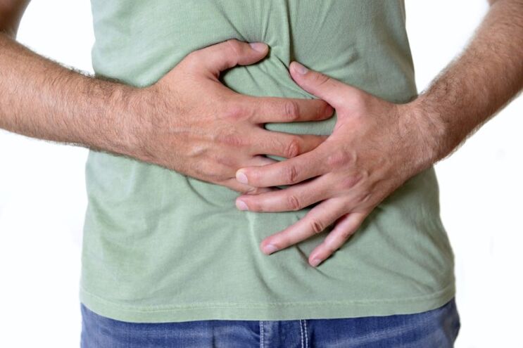 Pain and swelling - symptoms of the presence of worms in the intestines